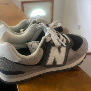 BOYS Gray and Black New Balance sneakers size 5.5